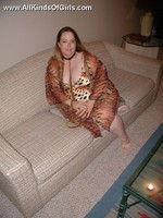 Leashed super fat milf spreading her legs and flashing her wet pussy.
