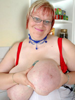 Lusty bbw wife likes to expose her enormous melons on a cam.