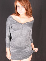 Red teen girl in a grey dress gets nude to present her chubby lovely body